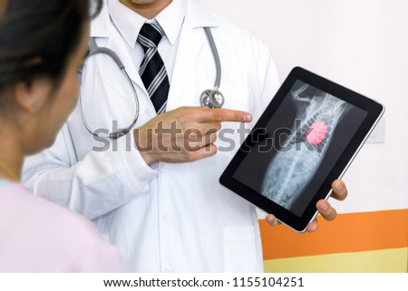 Artificial intelligence in smart healthcare hospital technology concept. Professional doctor use AI biomedical algorithm detect enlarged heart disease of pets with digital filmless X-Rays process.