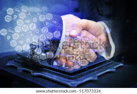 Industrial 4.0 and smart factory concept. Business people handshake holding hands with engineerer and industry infographic. Electric circuit and binary coded background