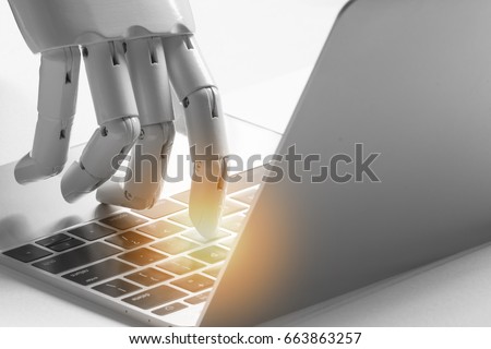 Artificial intelligence , robo advisor , chatbot , robotic concept. Robot finger point to laptop button with flare light effect.