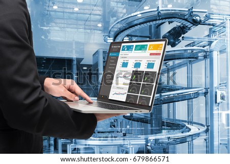 Male manager hand laptop for check real time production monitoring system application in smart factory industrial. Automated conveyor systems for package transfer machine Industry 4.0 and iot concept.