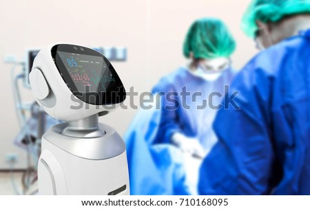 Robotic advisor service technology in healthcare smart hospital , artificial intelligence concept. Surgury Doctors in operating room and robot display status of patient.