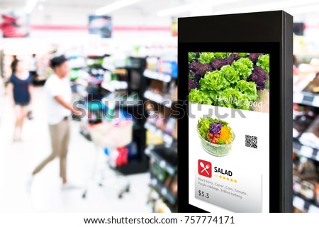 Intelligent Digital Signage , Augmented reality marketing and face recognition concept. Interactive artificial intelligence digital advertisement in retail hypermarket Mall.