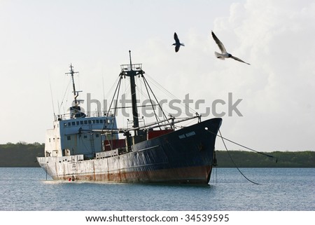 ghost boat sinking on the sea with doves  flying around