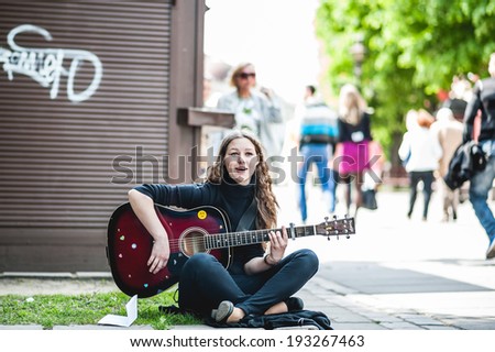 KAUNAS, LITHUANIA - MAY 17: The Street Musician\'s Day in Lithuania. Musicians make a performances on public places on May 17, 2014, Kaunas, Lithuania