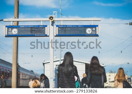 VILNIUS, LITHUANIA - MAY 07, 2015: People waiting train in Vilnius train station on May 7, 2015, Vilnius, Lithuania
