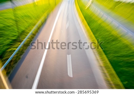 Blurred image of highway with zoom effect, top view