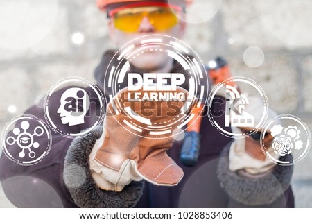 Industrial worker presses deep learning text button on a virtual interface. Deep Learning Computing Machine Analytics Artificial Intelligence Industry 4.0 concept.