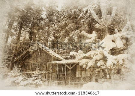 vintage winter landscape with wooden shelter in deep forest