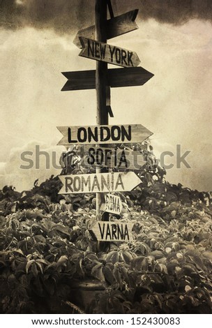 many directions sign- vintage textured vertical background
