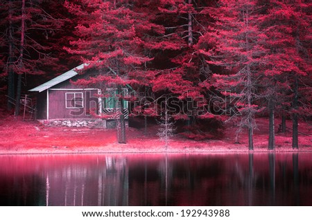infrared landscape with lake and wooden villa