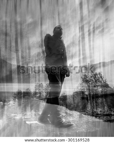 double exposure black and white man portrait walk over the ruins in the forest