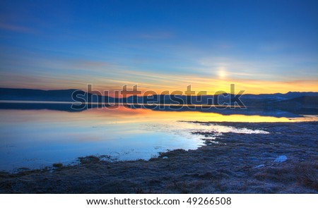 beautiful nature landscape; sunrise on the bulgarian Batak dam lake