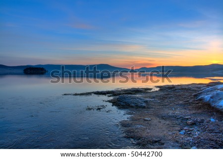 beautiful nature landscape; sunrise on the bulgarian Batak dam lake