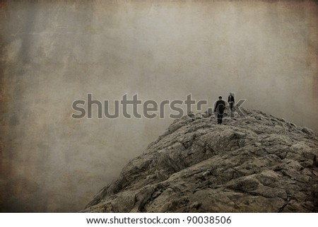 two man walk in high mountain; vintage style picture