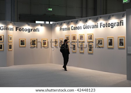 MILAN, ITALY - MARCH 30: An unidentified man visits picture gallery during Exhibition of Photography and Digital Image fair March 30, 2009 in Milan, Italy.