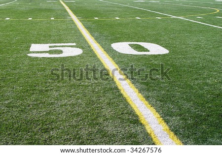 Close up of 50 yard line on football field