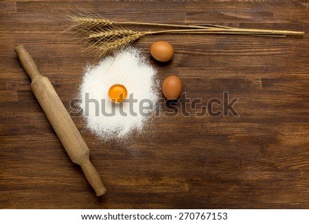 Close-up overhead shot of cookie ingredient on wooden table.