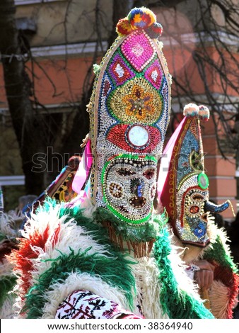 a spring celebrating carnival in Bulgaria People wear kukeri masks to frighten the bad spirits