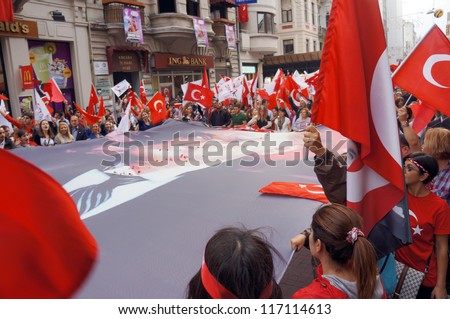 ISTANBUL,-OCT 29: Many people in Turkey celebrate Republic Day on October 29 by attending performances and participating in traditional processions with flags on October 29, 2012 in Istanbul,Turkey.