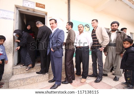 ARBIL-MARCH 07: Kurds flee to election centers to vote for the Iraqi General Elections in the capital of Kurdistan, Arbil. Iraq on March, 07, 2010.