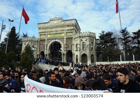 ISTANBUL,TURKEY-DECEMBER 28 : University students staged a protest on the first anniversary of Uludere massacre in front of the Istanbul University on December 28, 2012 in Istanbul,Turkey.