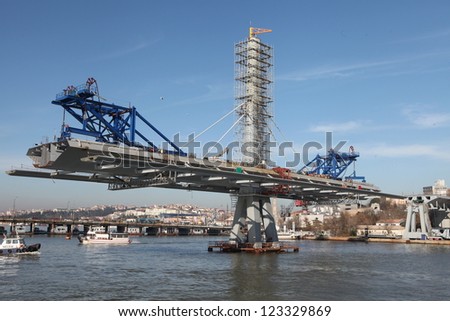 ISTANBUL, TURKEY-DECEMBER 26 : The ongoing construction of the Golden Horn Metro Bridge has been criticized for breaking city's skyline on December 26, 2012 in Istanbul,Turkey.