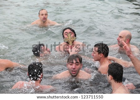 ISTANBUL,TURKEY-JANUARY 6: Orthodox Christians in Istanbul reenacted the baptism of Christ with a traditional cross-throwing ceremony on January 6, 2012 in istanbul,Turkey.