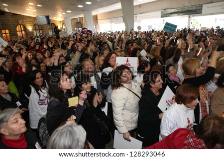 ISTANBUL, TURKEY-FEBRUARY 14 : Unidentified women participated to '1 billion rising' dance event to protest violence against women on ValentineÂ?Â?s Day on December 14, 2013 in Istanbul,Turkey.