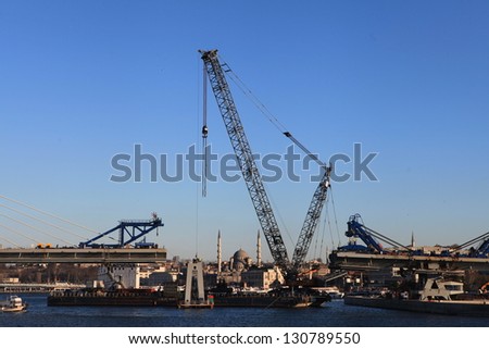 ISTANBUL, TURKEY-MARCH 5 : The ongoing construction of the Golden Horn Metro Bridge has been criticized for breaking city skyline on March 5, 2013 in Istanbul,Turkey