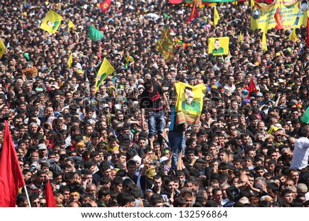 DIYARBAKIR,TURKEY - MARCH 21: Kurds celebrating their traditional feast Newroz that means 'new day' in kurdish on March 21, 2013 in Diyarbakir, Turkey.
