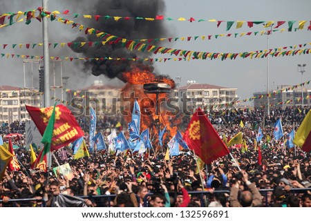 DIYARBAKIR,TURKEY - MARCH 21: Kurds celebrating their traditional feast Newroz that means \'new day\' in kurdish on March 21, 2013 in Diyarbakir, Turkey.