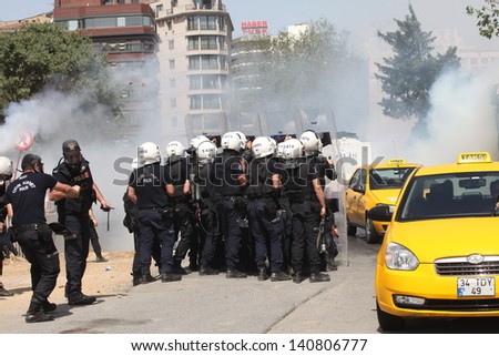 ISTANBUL,TURKEY-MAY 31: Police forces attacked Taksim Gezi Park protesters with tear gas and water cannons as protests continue for a fourth day on May 31, 2013 in Istanbul,Turkey.