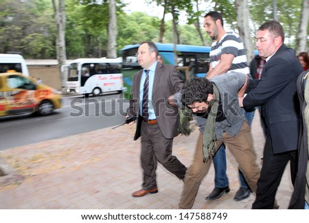 ISTANBUL, TURKEY-MAY 9: Turkish Police dispersed student protesters who protest Turkish Prime Minsiter Recep Tayyip Erdogan on May 9, 2013 in Istanbul, Turkey.