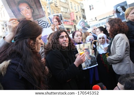 ISTANBUL, TURKEY-JANUARY 9: Demonstration marking the anniversary of the murder last year of three Kurdish women in Paris was put down by the police on January 9 2014 in Istanbul,Turkey.