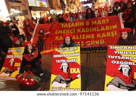 ISTANBUL,TURKEY-MARCH 8: Unidentified woman in purple costume celebrates international women's day on March 8,2012,in Istanbul,Turkey