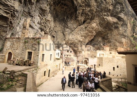 TRABZON, TURKEY - MAY 26: Tourists visit Sumela Monastery on May 26, 2011 in Trabzon,Turkey. Sumela is 1600 year old ancient Orthodox monastery.
