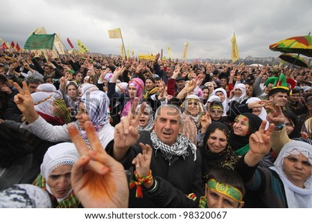 ISTANBUL,TURKEY - MARCH 20: Kurds celebrating their traditional feast Newroz that means \'new day\' in kurdish on March 20, 2011 in Istanbul, Turkey.