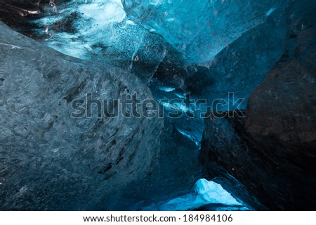 Inside an icecave in Vatnajokull, Iceland.  The ice is thousands of years old and so packed it is harder than steel and crystal clear.