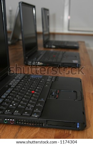 several laptops set up for user training