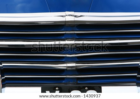 stock photo photograph of the grill on an old classic car in mint 