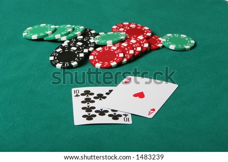 Cards in a black jack game, Winning hand with betting chips on the table