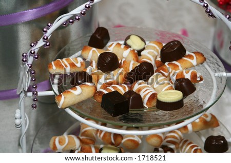 A tray filled with chocolate and marsipan confectionary treats.