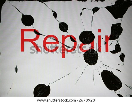 A closeup shot of a broken laptop display with the word repair written on it, the screen is turned on