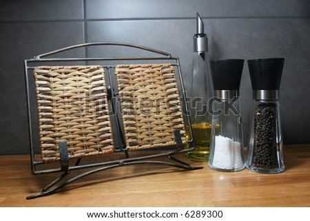 still life of kitchen items, salt and pepper, olive oil flask
