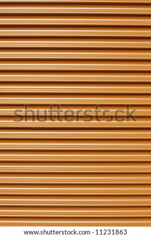 Orange corrugated tin sheet, perfect for designs or backgrounds