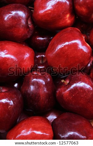 A pile of red apples at a farmers market