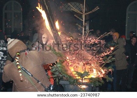 REYKJAVIK, ICELAND - JANUARY 21, 2009: A protester sets fire to some fodder at riots during protests against the Icelandic  government's handling of the economy on January 21, 2009.