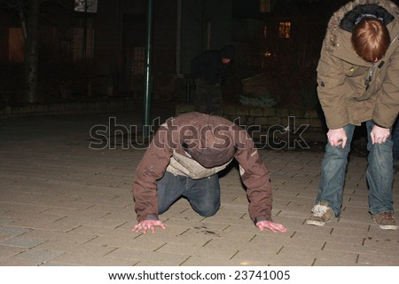 REYKJAVIK, ICELAND - JANUARY 21, 2009: A protester vomits after tear gas was used by police at riots during protests against the Icelandic government\'s handling of the economy on January, 21 2009.