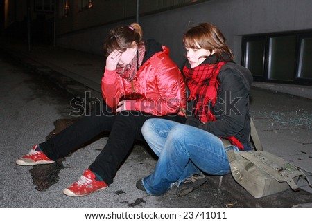 REYKJAVIK, ICELAND - JANUARY 21, 2009: Protesters recovering after tear gas was used by police at riots during protests against the Icelandic government\'s handling of the economy on January 21, 2009.