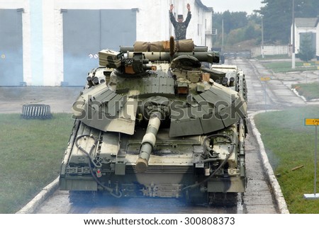 Goncharovsk, Ukraine- 8 October 2008. Ukrainian tank T-64BM Bulat unloaded from the trailer.